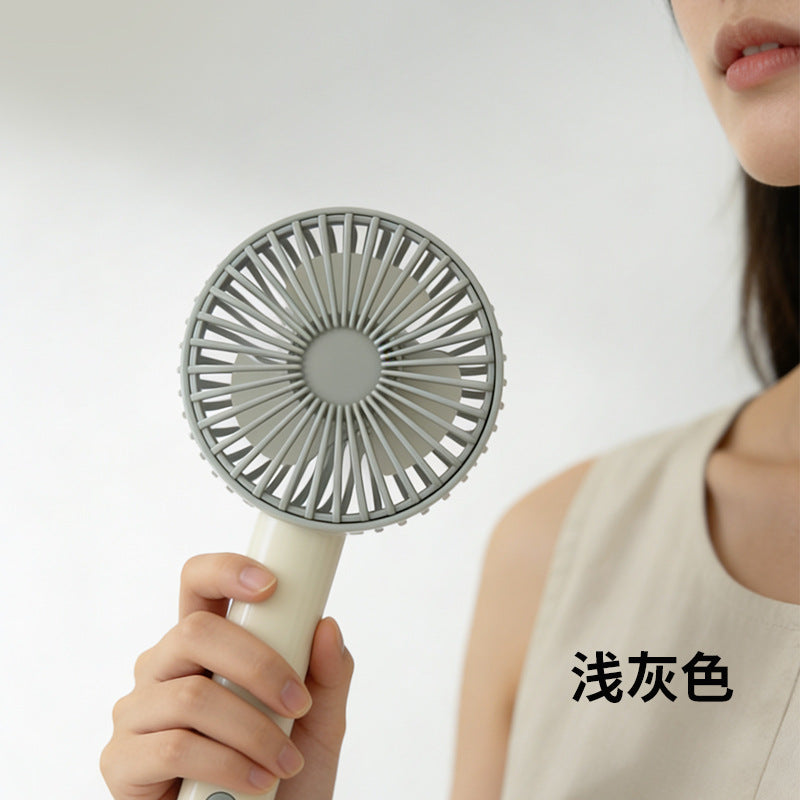 Women's portable handheld fan with ergonomic grip and powerful battery technology Stornfield