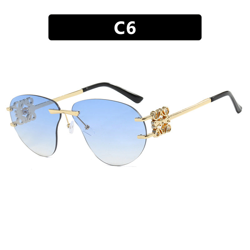 Women's fashionable sunglasses in elegant aviator style with gemstone details Stornfield