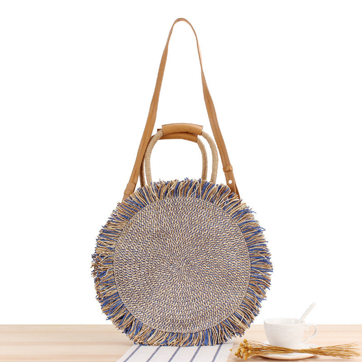 Round Bast shoulder bag with fringes and leather handles Stornfield