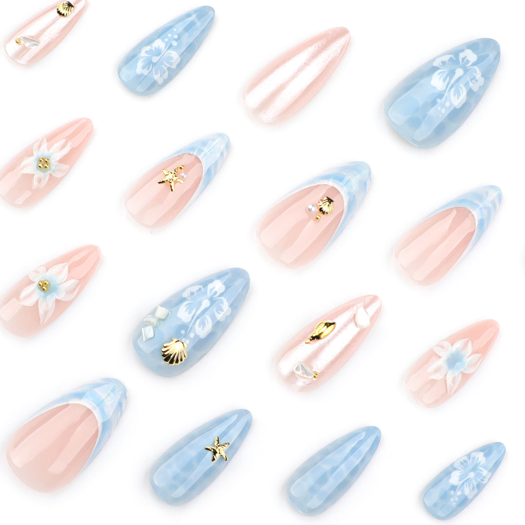 Artful nail extensions with delicate floral designs and glitter accents Stornfield