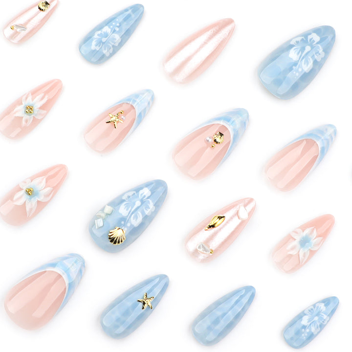 Artful nail extensions with delicate floral designs and glitter accents Stornfield