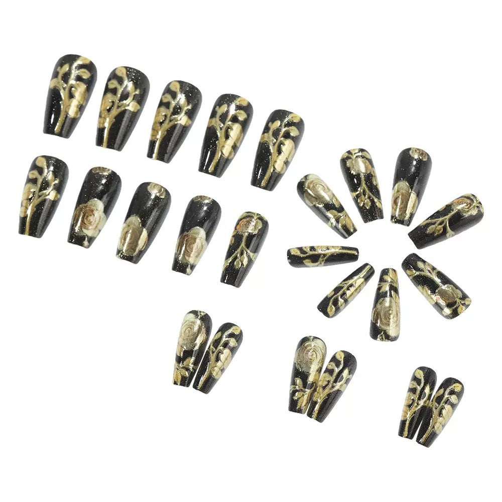 Artificial nail set with elegant golden rose decorations Stornfield
