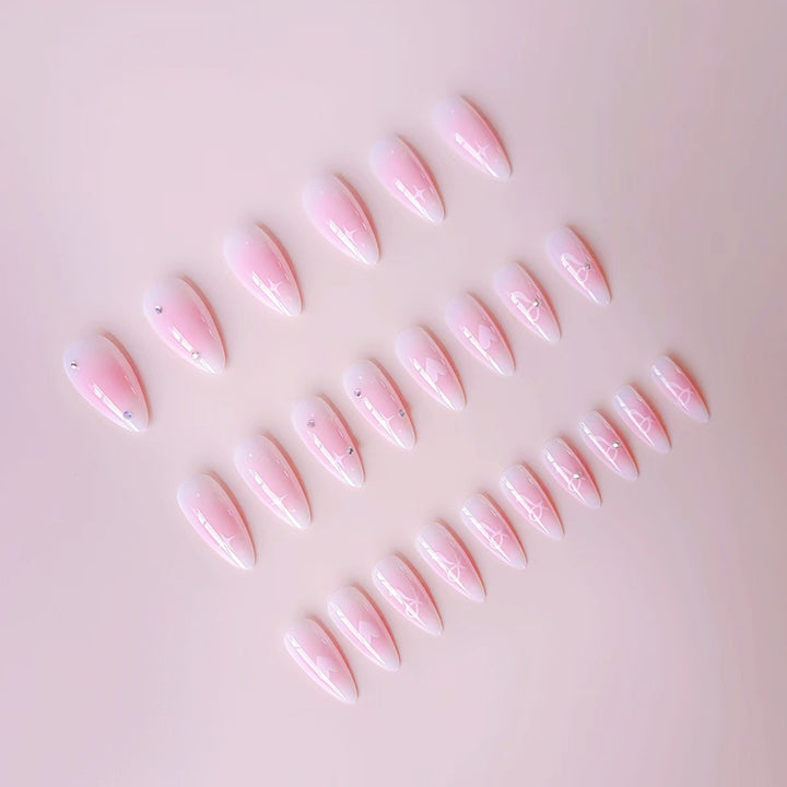 Artificial nail set with romantic heart design and embellished accents Stornfield