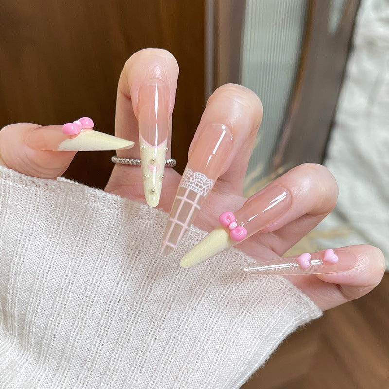 Artistic Press-On Nail Design with Cute Bow Accents Stornfield