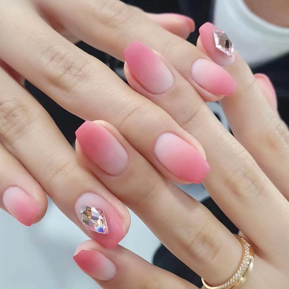 Glamorous nail art with elegant rhinestone accents Stornfield