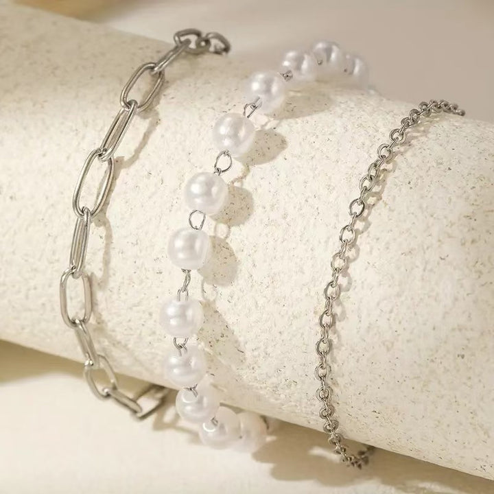 Elegant Layered Pearl and Chain Bracelet Set Stornfield