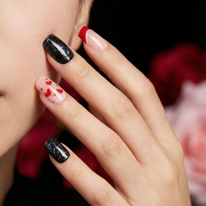 Creative artificial nails with heart design and glitter effects Stornfield