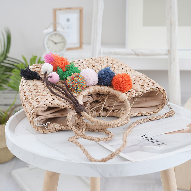 Basket bag with colorful pompons Stornfield