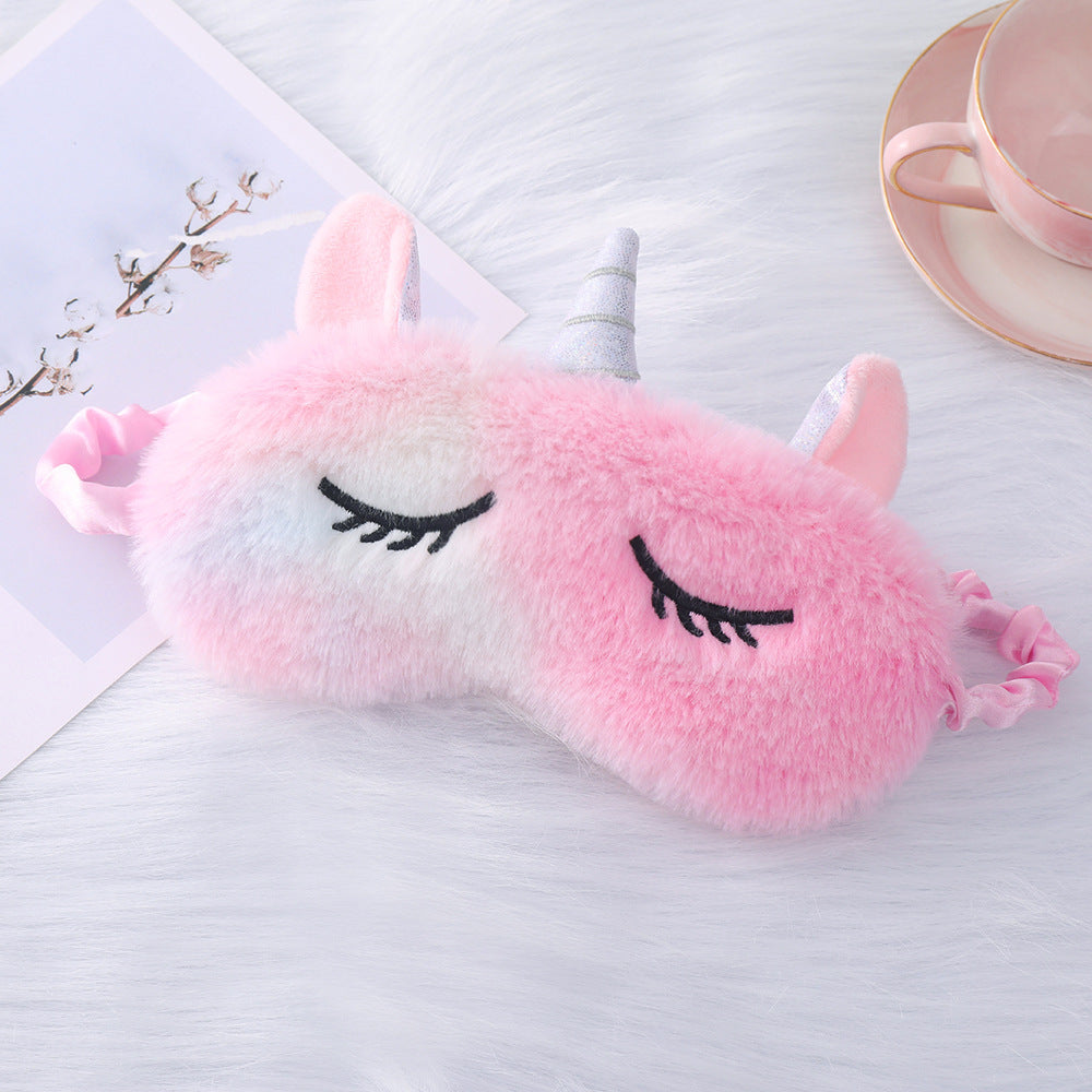Women's plush-filled unicorn sleep mask with 3D horn, embroidered eyelashes and adjustable satin band Stornfield