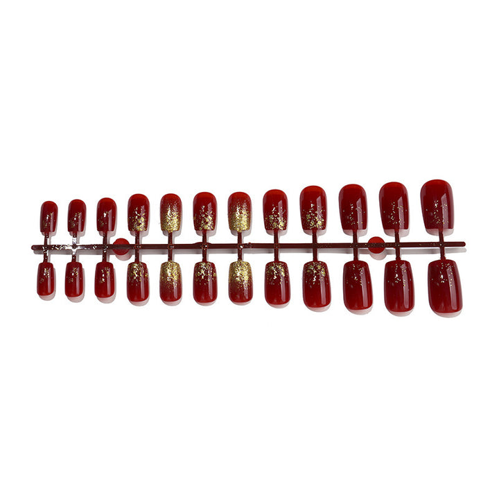 Acrylic nail set with sparkling accents and festive design Stornfield