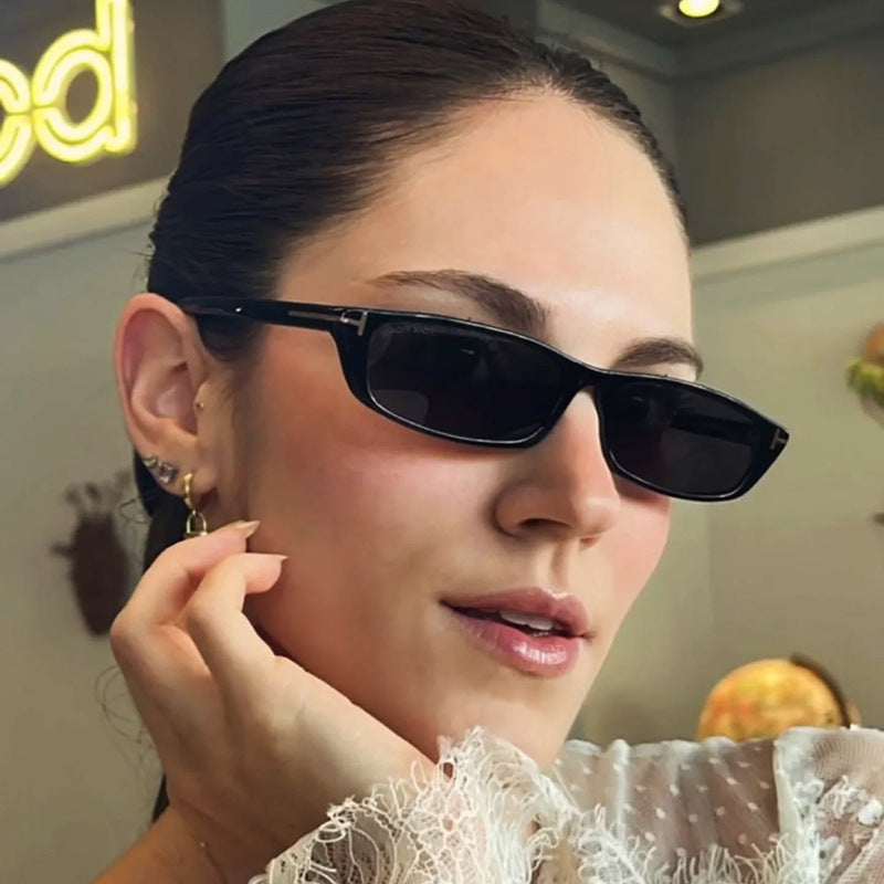 Women's fashionable sunglasses with narrow frame and brown lenses Stornfield