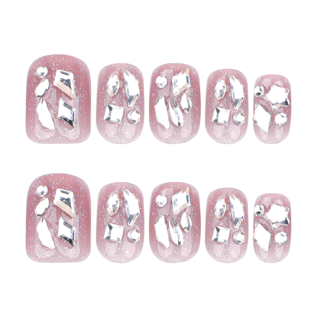 Artificial nail art with glamorous glitter accents Stornfield