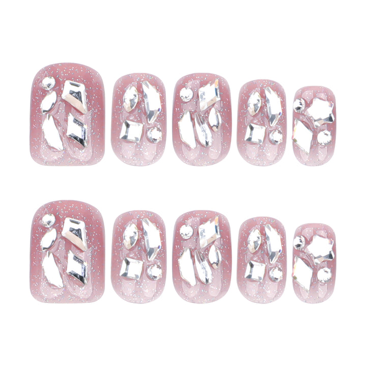 Artificial nail art with glamorous glitter accents Stornfield