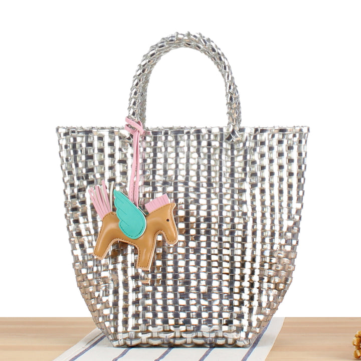 Playful basket bag with unique pendant Stornfield