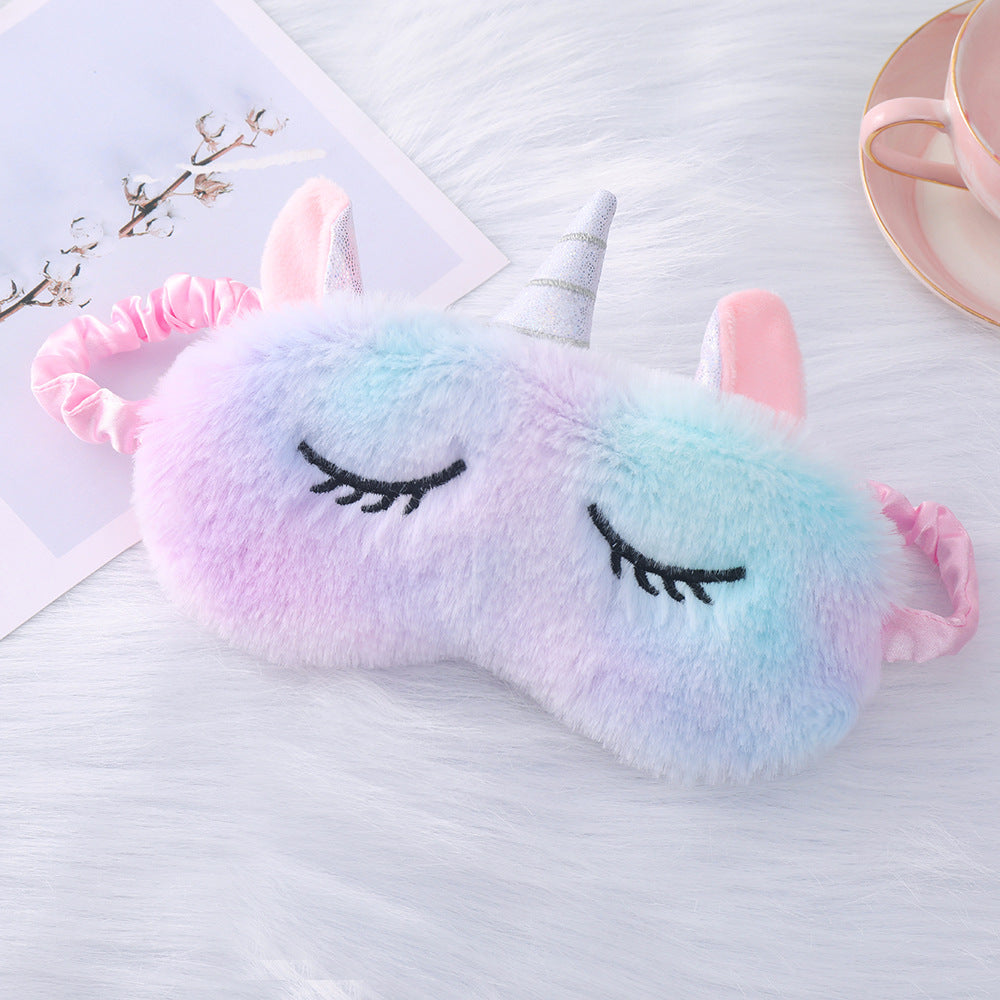 Women's plush-filled unicorn sleep mask with 3D horn, embroidered eyelashes and adjustable satin band Stornfield