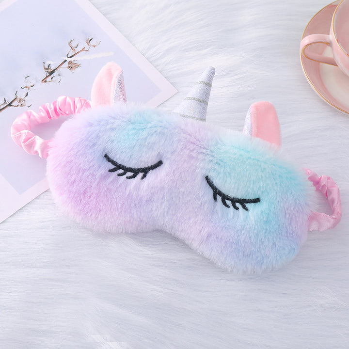 Women's plush-filled unicorn sleep mask with 3D horn, embroidered eyelashes and adjustable satin band Stornfield