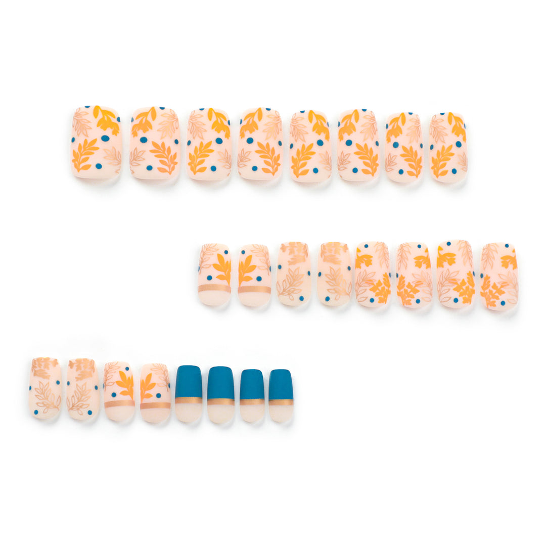 Artistic nail design with floral and golden accent Stornfield