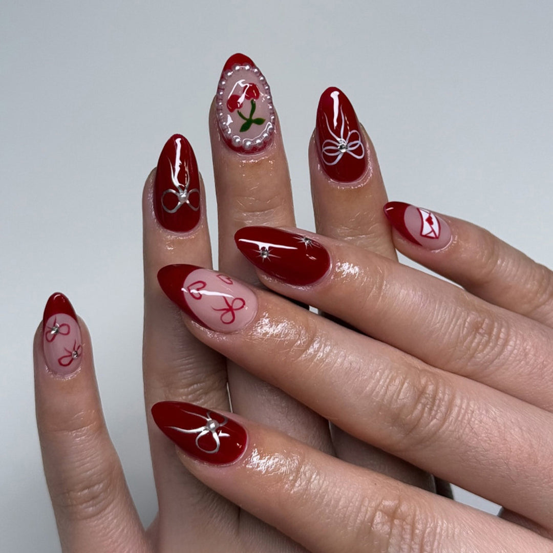 Artificial nail art with playful dots and bows Stornfield