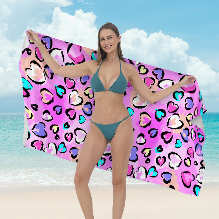 Beach towel with vibrant tropical plant motif Stornfield