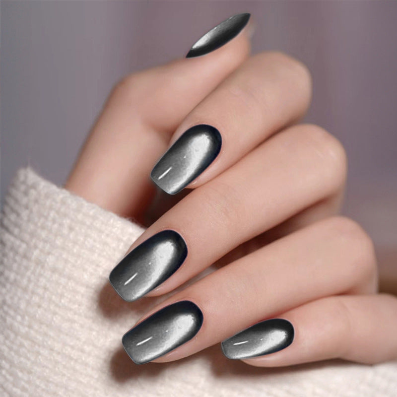 Artificial nail set with glamorous black glitter accents Stornfield