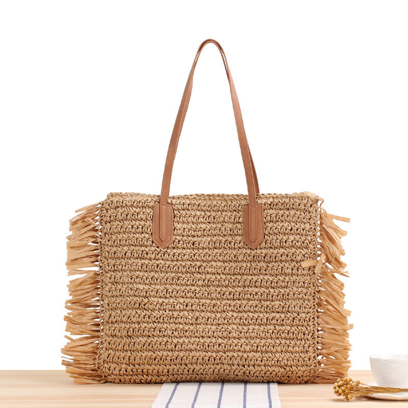Beach bag with fringes and sturdy leather handles Stornfield