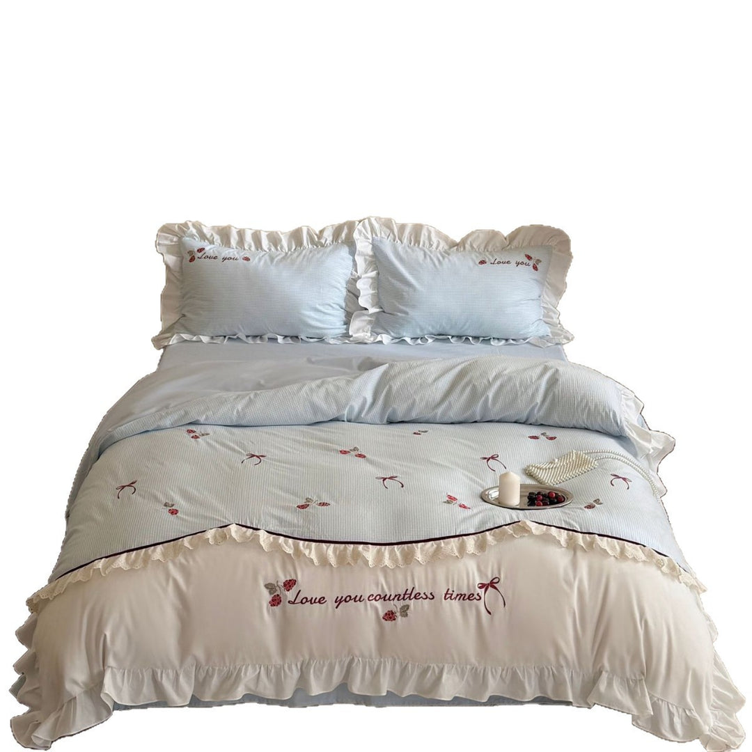 Bedding set made of breathable cotton blend with ruffle and flower bow embroidery