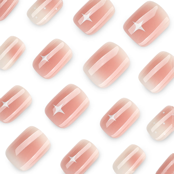 Nail art with ombre effect and glitter accents Stornfield