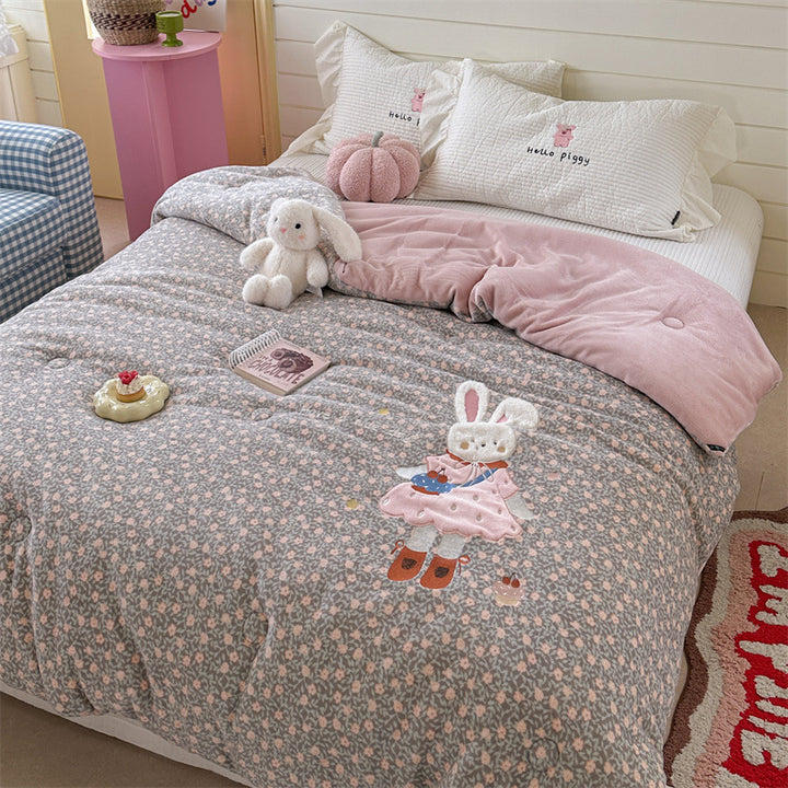quilted cuddly blanket with 3D rabbit applique and floral microfiber cover