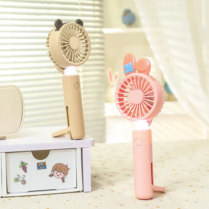 Ladies portable handheld fan with integrated LED light and animal ear design Stornfield