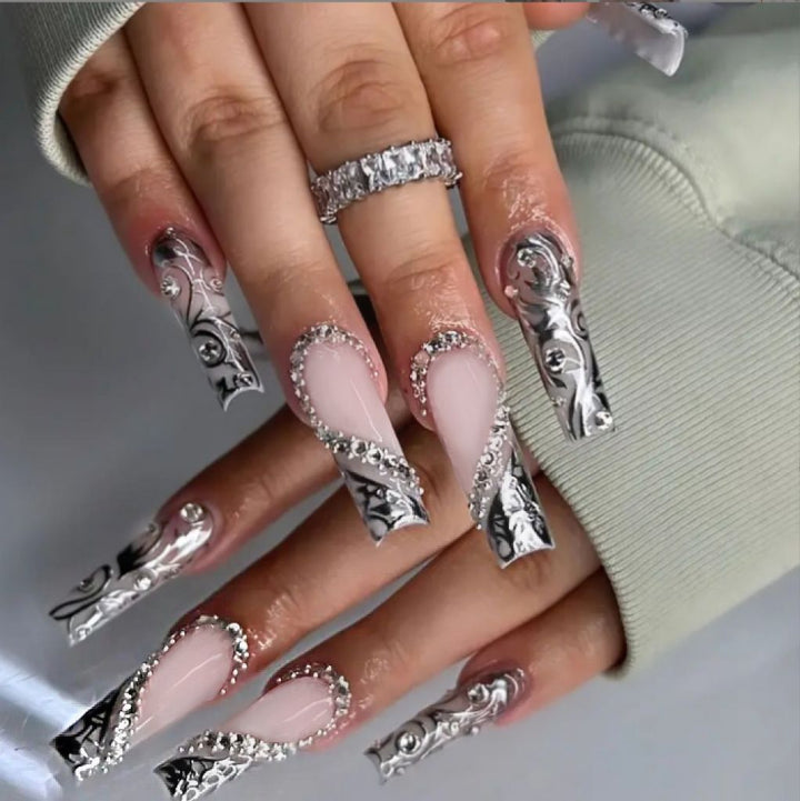 Elegant artificial nails with stylish embellishments Stornfield