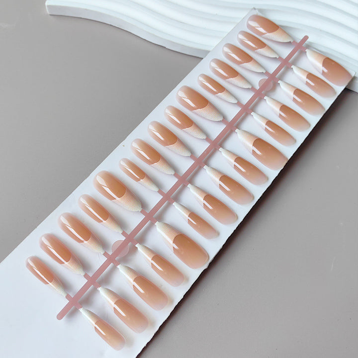 Artificial nails in the elegant French tip design Stornfield