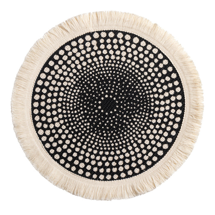 Round woven Boho rug mat with decorative fringes Stornfield