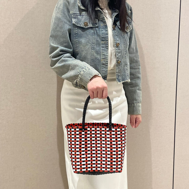 Handwoven basket bag with colorful design Stornfield