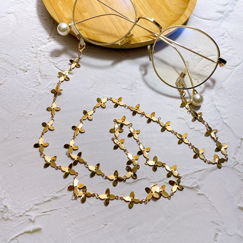 Fashionable glasses holder chain with filigree flower pendants Stornfield