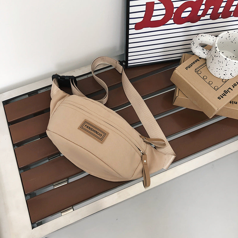 Sleek Multi-Compartment Sling Bag