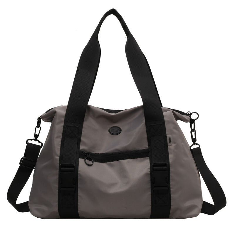 Spacious sports duffel bag with ergonomic carrying handles and water-repellent material Stornfield