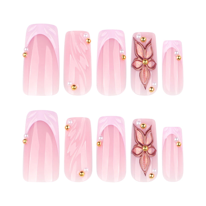 Artistic acrylic nails with flower design and glitter variations Stornfield