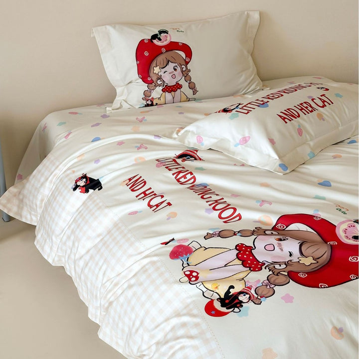 Bedding set for children made of cotton satin with contrasting piping and puppy print