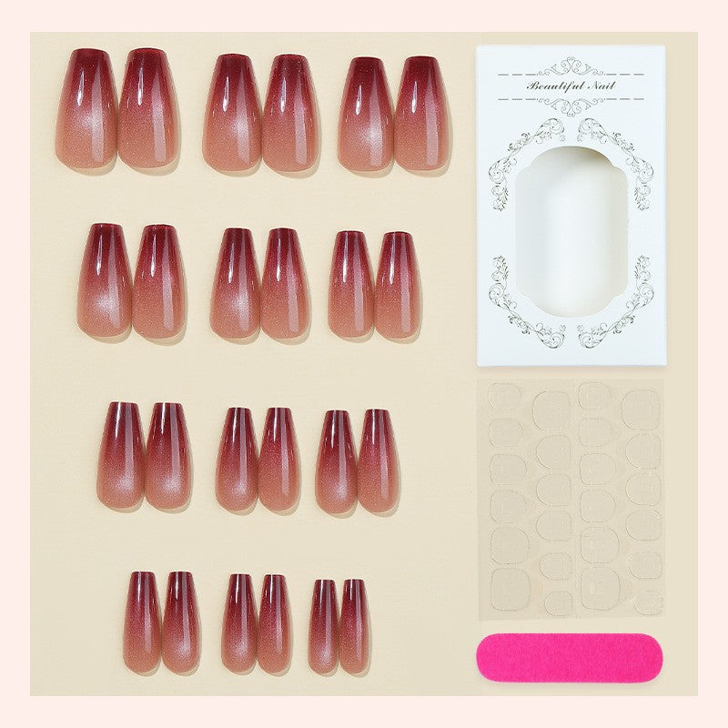 Acrylic nail set with glamorous gradient and glitter accents Stornfield