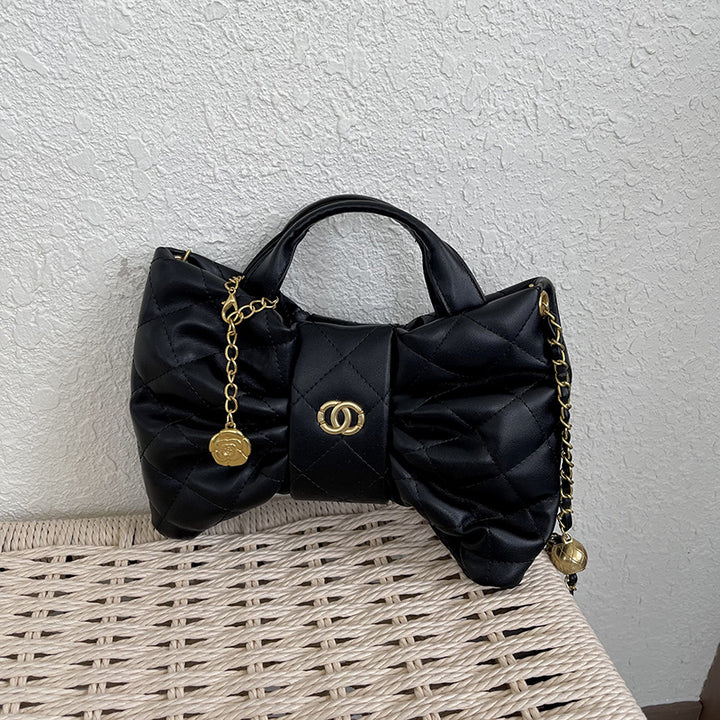 Quilted Bow Accent Handbag