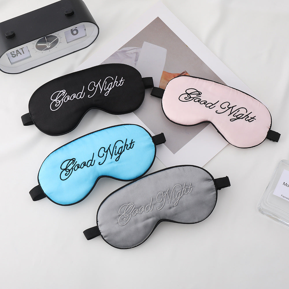 Unisex embroidered contoured sleep mask with decorative text embroidery and adjustable elastic band Stornfield