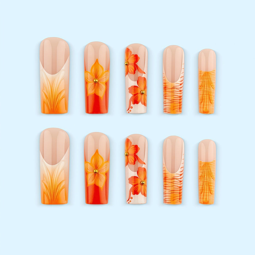 Nail art with floral accents and glitter Stornfield