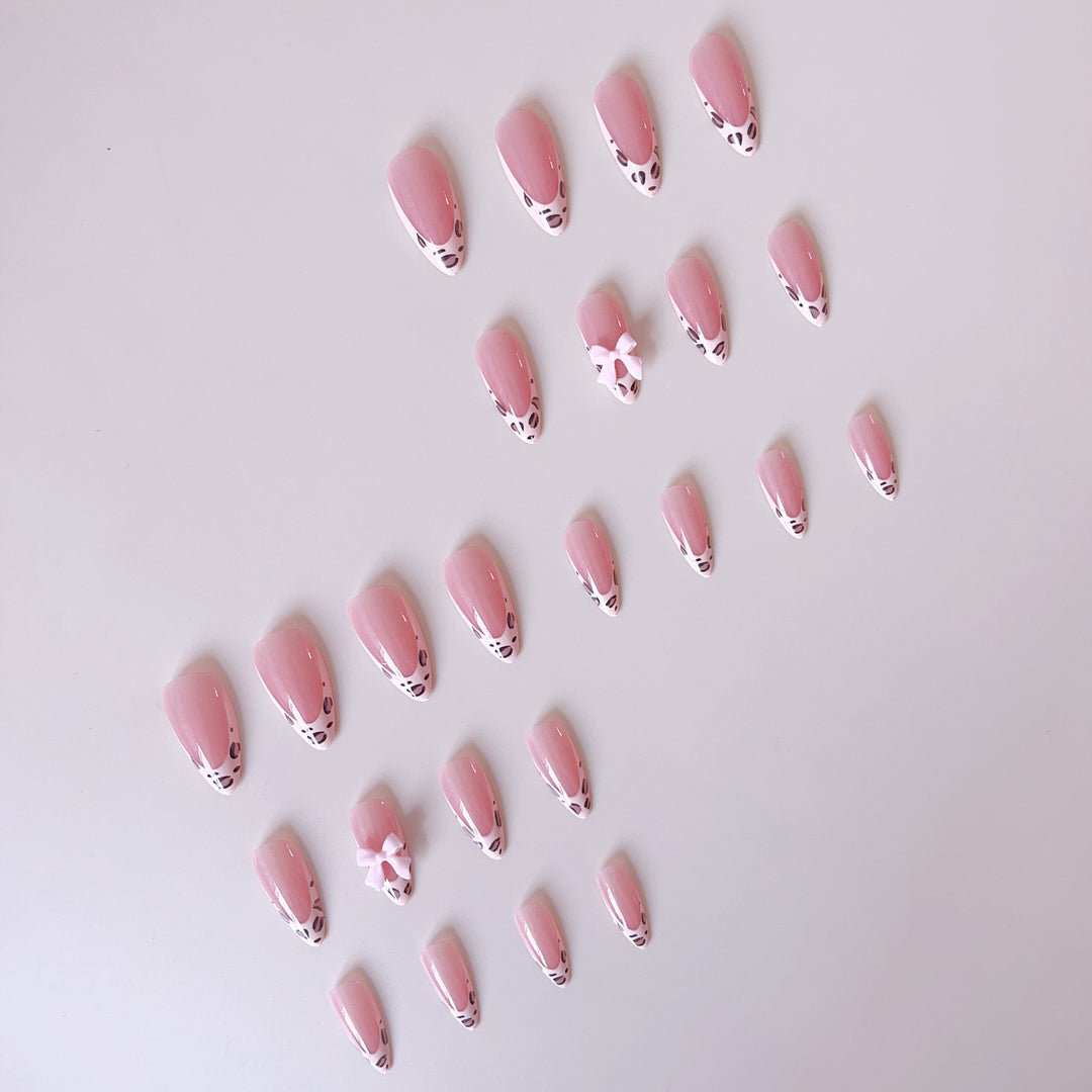 Acrylic nail set with leopard pattern and decorative bows Stornfield