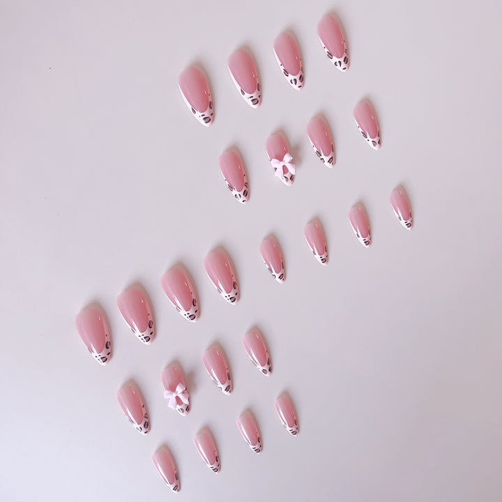 Acrylic nail set with leopard pattern and decorative bows Stornfield