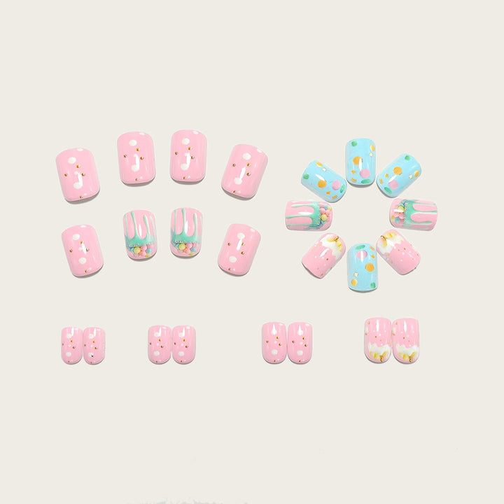 Artificial nails with playful cupcake design Stornfield
