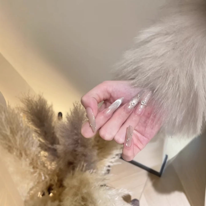 Artistic Stiletto Nail Art Extensions with Rhinestone Accents