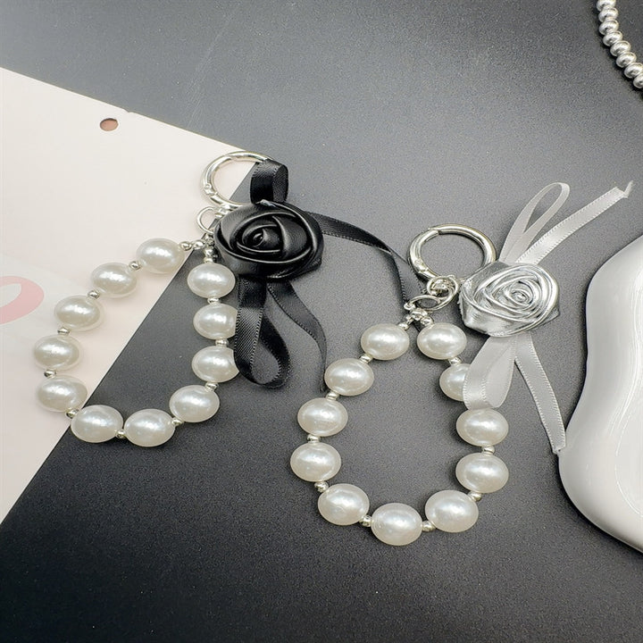 Elegant Pearl and Leather Charm Keychain Stornfield