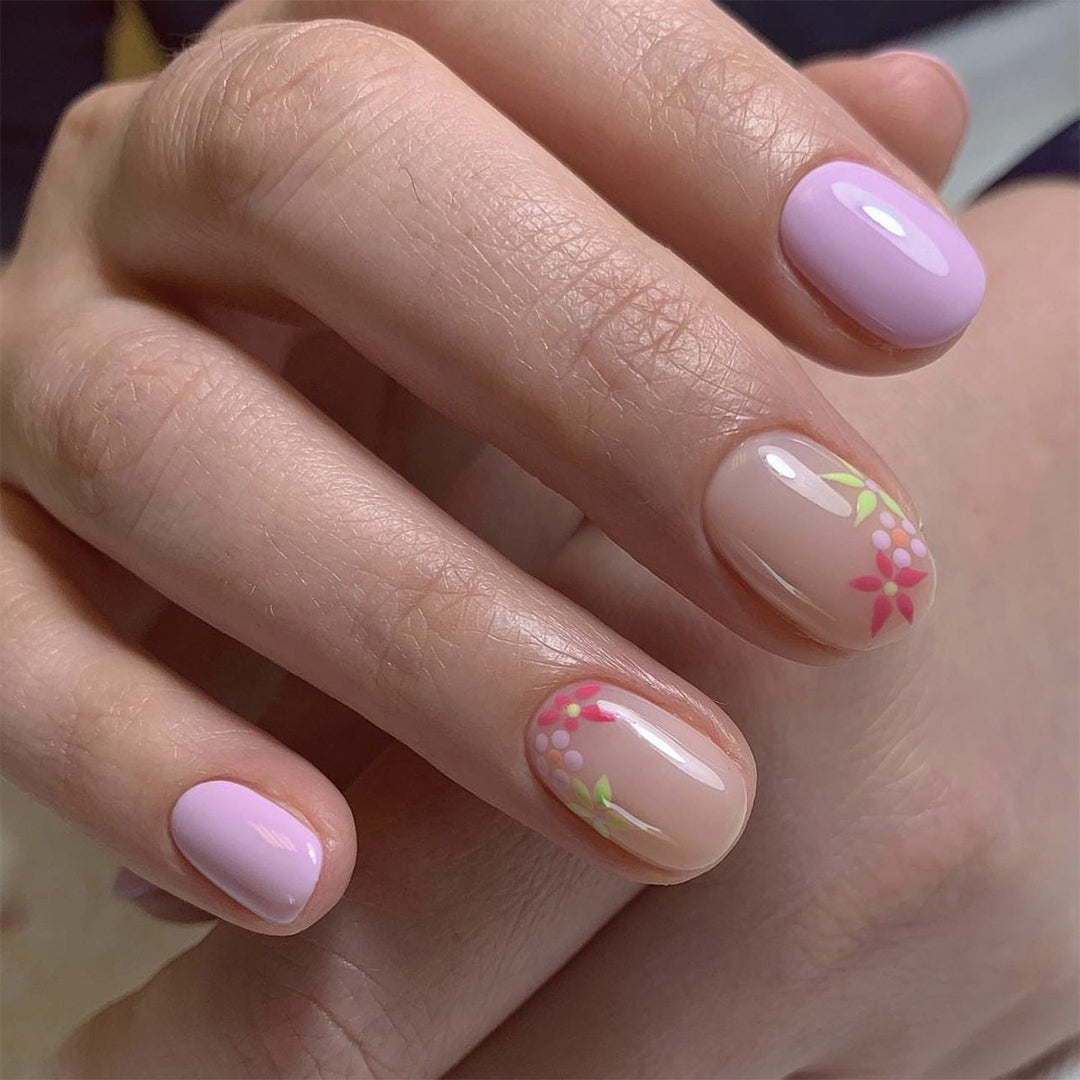Artful nail extensions with an elegant leaf pattern Stornfield