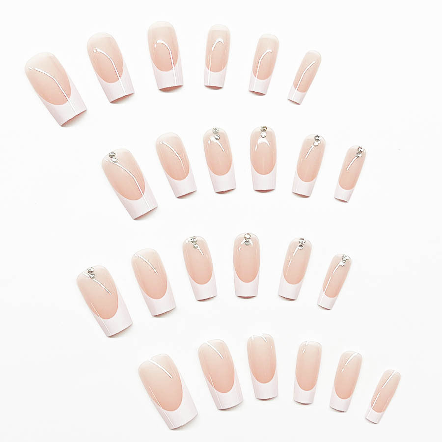 Elegant artificial nail set with high-gloss finish and rhinestone decorations Stornfield