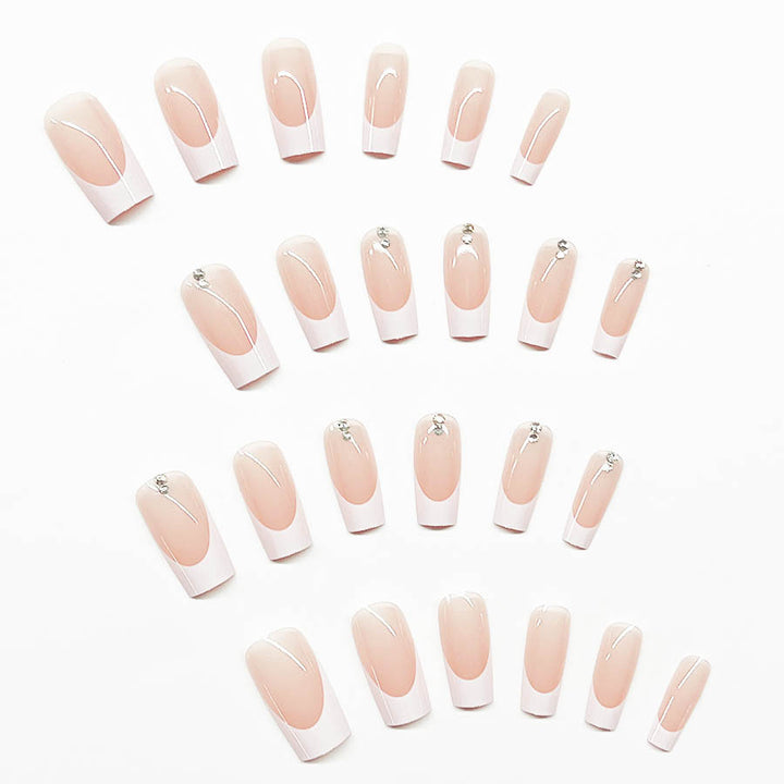 Elegant artificial nail set with high-gloss finish and rhinestone decorations Stornfield